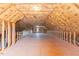 Unfinished attic space offering potential for customization and additional living area at 10 Georgetown Woods Dr, Youngsville, NC 27596