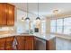 Kitchen island with granite countertops and stainless steel dishwasher at 10 Georgetown Woods Dr, Youngsville, NC 27596
