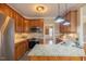 Well-lit kitchen featuring granite countertops and stainless steel appliances at 10 Georgetown Woods Dr, Youngsville, NC 27596