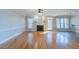 Spacious living room with fireplace, hardwood floors, and backyard access at 10 Georgetown Woods Dr, Youngsville, NC 27596