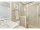 Bathroom showcasing a tiled glass-enclosed shower, neutral walls, and a marble countertop vanity at 1101 Bessie Ct, Wake Forest, NC 27587