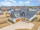 Stunning home featuring a modern farmhouse design with a spacious driveway and manicured lawn at 1101 Bessie Ct, Wake Forest, NC 27587