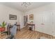 Home office with hardwood style floors and lots of natural light at 1101 Bessie Ct, Wake Forest, NC 27587