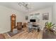 Home office featuring a grandfather clock and large windows providing natural light at 1101 Bessie Ct, Wake Forest, NC 27587