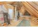The unfinished attic space reveals exposed beams and a newly installed HVAC system at 1101 Bessie Ct, Wake Forest, NC 27587