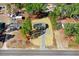 Aerial view of a single-Gathering home with long driveway and a partially shaded front yard at 112 Mckoy Town Rd, Cameron, NC 28326
