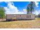 Well-maintained backyard with a deck and lush lawn at 112 Mckoy Town Rd, Cameron, NC 28326