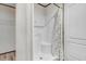All-white bathroom with standup shower and decorative shower curtain at 112 Mckoy Town Rd, Cameron, NC 28326