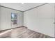 The bedroom has wood-grain floors and a nice window to the outside at 112 Mckoy Town Rd, Cameron, NC 28326
