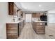 Stylish kitchen featuring a central island, wood cabinets and sleek appliances at 112 Mckoy Town Rd, Cameron, NC 28326