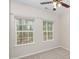 Bedroom with a plush carpet and large windows to let in the natural light at 113 Callowhill Ln, Durham, NC 27713