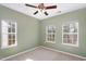 Well-lit bedroom with three windows offering pleasant natural light at 113 Callowhill Ln, Durham, NC 27713
