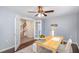 Cozy home office with natural light, neutral tones, french doors, and space for productivity at 113 Callowhill Ln, Durham, NC 27713