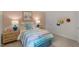 Charming bedroom with colorful bedding, stylish decor, and ample natural light at 135 Scenic Rock Dr, Youngsville, NC 27596
