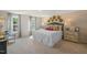 Bedroom features an accent wall, many windows and natural light at 135 Scenic Rock Dr, Youngsville, NC 27596