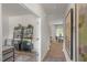 Hallway view with a glimpse into a stylishly furnished dining room, with modern decor at 135 Scenic Rock Dr, Youngsville, NC 27596