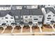 Aerial view of townhomes featuring cohesive design and landscaping, creating an appealing streetscape at 1430 Rosepine Dr, Cary, NC 27519