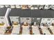 Aerial view of townhomes showcasing parking in front of each unit and manicured landscape at 1430 Rosepine Dr, Cary, NC 27519