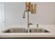 Modern kitchen sink with stainless steel faucet and double basin at 1430 Rosepine Dr, Cary, NC 27519