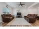 Spacious living room featuring hardwood floors, ceiling fan, and comfortable seating at 1430 Rosepine Dr, Cary, NC 27519