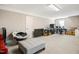 Large bonus room with a neutral color scheme, ideal for relaxation or entertainment at 156 Bornean Dr, Garner, NC 27529