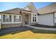 Inviting entrance with stone accents and a well-lit pathway at 156 Bornean Dr, Garner, NC 27529