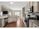 Spacious kitchen with granite countertops and stainless steel appliances at 156 Bornean Dr, Garner, NC 27529