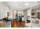 Bright kitchen featuring granite countertops and stainless steel appliances at 156 Bornean Dr, Garner, NC 27529