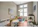 Playroom with hardwood floors, large window and an array of toys at 156 Bornean Dr, Garner, NC 27529
