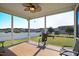 Relaxing screened porch with outdoor seating, perfect for enjoying the backyard view at 156 Bornean Dr, Garner, NC 27529