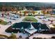 Stunning aerial view of clubhouse surrounded by colorful fall foliage at 162 Lookout Rdg # 677, Pittsboro, NC 27312