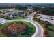 Aerial view of the community with lush landscaping and walking trails at 162 Lookout Rdg # 677, Pittsboro, NC 27312