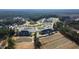 Panoramic aerial view showcasing the neighborhood amenities with mature trees and landscaping at 162 Lookout Rdg # 677, Pittsboro, NC 27312
