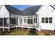 Expansive backyard with a screened in porch and deck that enhance outdoor living at 162 Lookout Rdg # 677, Pittsboro, NC 27312