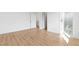 View of an empty bedroom with wood floors and white walls leading to the bathroom and stairs at 162 Lookout Rdg # 677, Pittsboro, NC 27312