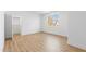 Spacious bedroom with wood floors, a window view, and walk-in closet at 162 Lookout Rdg # 677, Pittsboro, NC 27312