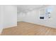 Bright, airy bedroom with hardwood floors, recessed lighting, and a window view at 162 Lookout Rdg # 677, Pittsboro, NC 27312
