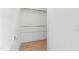 Bright walk-in closet with a metal rod and shelves, perfect for organizing all your clothes and accessories at 162 Lookout Rdg # 677, Pittsboro, NC 27312