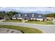 Clubhouse with manicured lawn and circle driveway at 162 Lookout Rdg # 677, Pittsboro, NC 27312