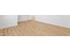 Wood floors are the focal point of this modern empty living room at 162 Lookout Rdg # 677, Pittsboro, NC 27312