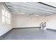 Spacious garage with painted floors and modern lighting at 162 Lookout Rdg # 677, Pittsboro, NC 27312