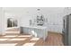 Gourmet kitchen featuring an island, modern appliances, and an open layout at 162 Lookout Rdg # 677, Pittsboro, NC 27312