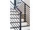 Modern staircase with black metal railing and white stairs at 162 Lookout Rdg # 677, Pittsboro, NC 27312