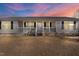 Charming one story home with a covered front porch and black shutters at 186 Sunrise Dr, Sanford, NC 27332