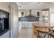Open kitchen featuring stainless steel appliances and an island at 186 Sunrise Dr, Sanford, NC 27332