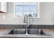 Close up of sink with stainless steel appliances at 186 Sunrise Dr, Sanford, NC 27332