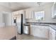 Kitchen features stainless steel appliances and white cabinets at 186 Sunrise Dr, Sanford, NC 27332