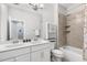 Bright bathroom includes double sinks and a shower/tub at 200 Gravel Brook Ct, Cary, NC 27519
