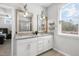 Bathroom features a double sink vanity, granite counters, and tile floors at 200 Gravel Brook Ct, Cary, NC 27519