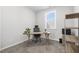 Home office featuring neutral walls, a modern desk, and a comfortable chair at 200 Gravel Brook Ct, Cary, NC 27519